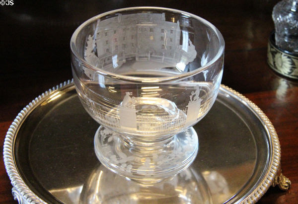 Glass bowl engraved with view of Traquair House in dining room at Traquair House. Scotland.