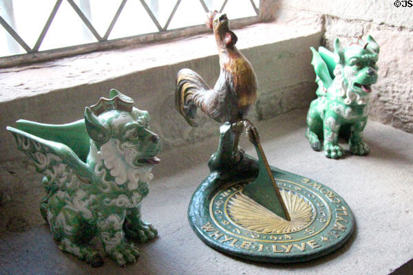Ceramic fanciful Chinese creatures flank sundial with cock at Glamis Castle. Angus, Scotland.