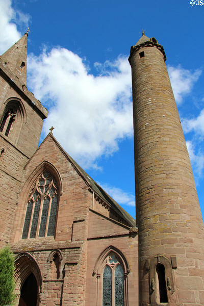 Medieval Irish-type round tower (11thC) beside later Brechin Cathedral. Brechin, Scotland.