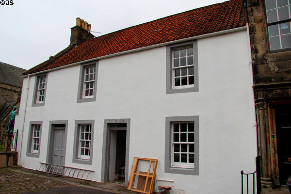 Cottage (1777) with lintel "17 GL4x BUILDING 77". Falkland, Scotland.