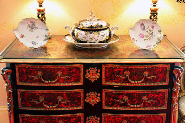 Inlaid chest of drawers with porcelain pieces in Ambassador's room at Scone Palace. Perth, Scotland.