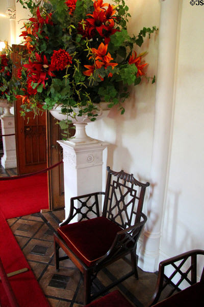 Floral display & Chinese-style chair in long gallery at Scone Palace. Perth, Scotland.