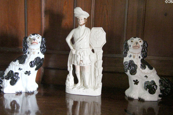 Rob Roy porcelain figurine with ceramic dogs at Craigievar Castle. Alford, Scotland.