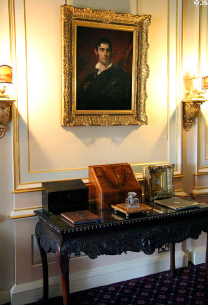 George, 4th Earl of Aberdeen portrait over side table with inkwell in upstairs hall at Haddo House. Methlick, Scotland.