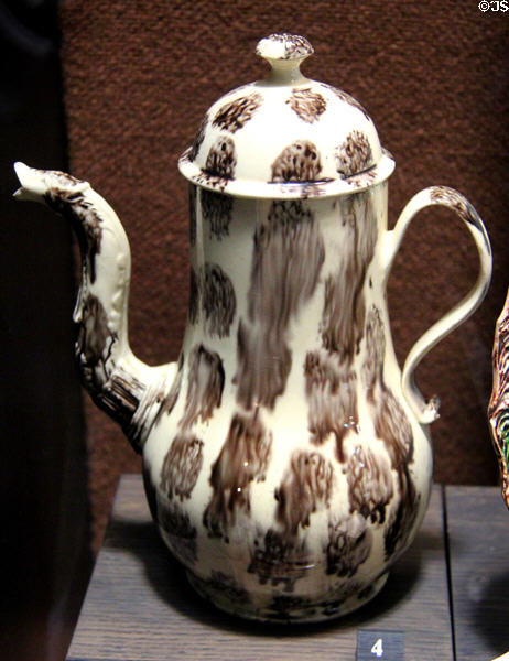 Earthenware coffee pot stained with colored oxides under lead glaze (c1750-70) attrib. Thomas Whieldon but also made by others of Straffordshire at Potteries Museum & Art Gallery. Hanley, Stoke-on-Trent, England.