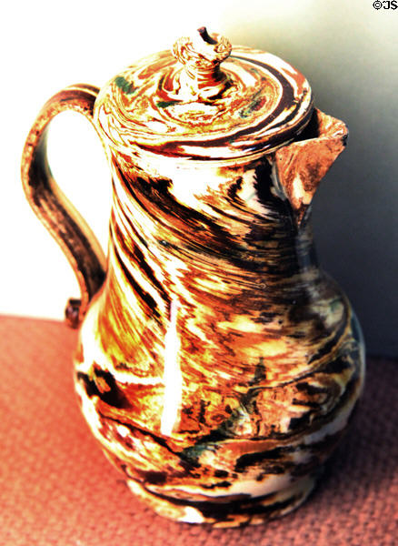 Covered jug thrown with mixture of colored clays (aka agate) (c1750-70) made in Straffordshire at Potteries Museum & Art Gallery. Hanley, Stoke-on-Trent, England.
