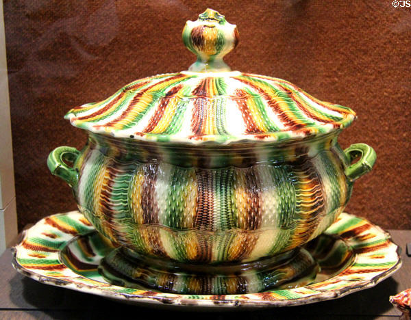 Earthenware tureen stained with colored oxides under lead glaze (c1750-70) possibly Thomas Whieldon pot works of Fenton, Straffordshire at Potteries Museum & Art Gallery. Hanley, Stoke-on-Trent, England.