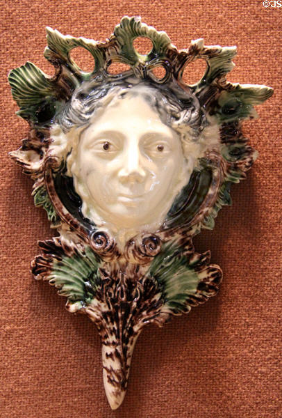 Earthenware wall pocket depicting Flora stained with colored oxides under lead glaze (c1750-70) probably Thomas Whieldon pot works of Fenton, Straffordshire at Potteries Museum & Art Gallery. Hanley, Stoke-on-Trent, England.