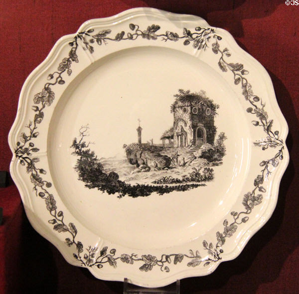 Creamware plate with Queen's shape border with transfer printing of ruined church (1765-1800) Impressed Wedgwood IIII of Burslem or Etruria, Staffordshire at Potteries Museum & Art Gallery. Hanley, Stoke-on-Trent, England.