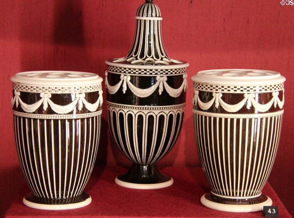 Earthenware black & white neoclassical vases (1780-1800) impressed Wedgwood of Etruria, at Potteries Museum & Art Gallery. Hanley, Stoke-on-Trent, England.