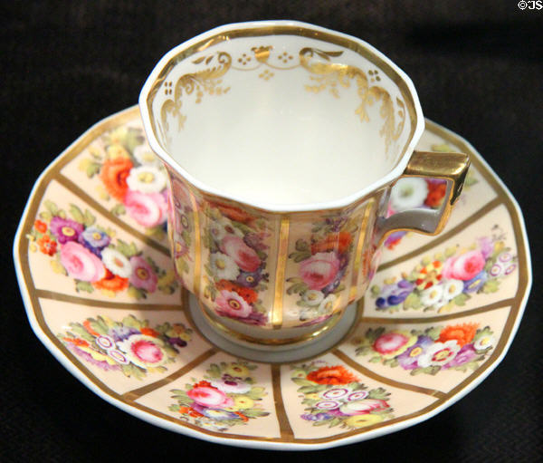 Bone china cup & saucer with floral decoration & gilding (c1830-33) by Josiah Spode of Stoke-upon-Trent at Potteries Museum & Art Gallery. Hanley, Stoke-on-Trent, England.