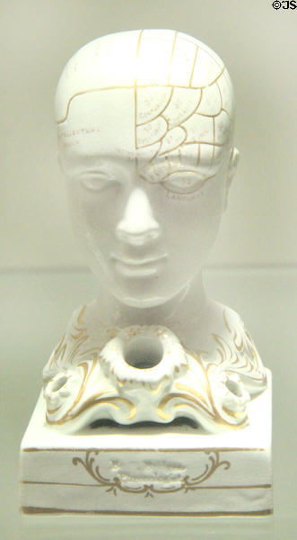 Ironstone penholder in form of phrenological head to advertise 'F Bridges Phrenologist' (c1860s) prob. from Staffordshire at Potteries Museum & Art Gallery. Hanley, Stoke-on-Trent, England.