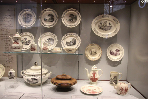 Collection of Queen's Ware plates & vessels transfer-printed in black or red (1770s) by Wedgwood at World of Wedgwood. Barlaston, Stoke, England.