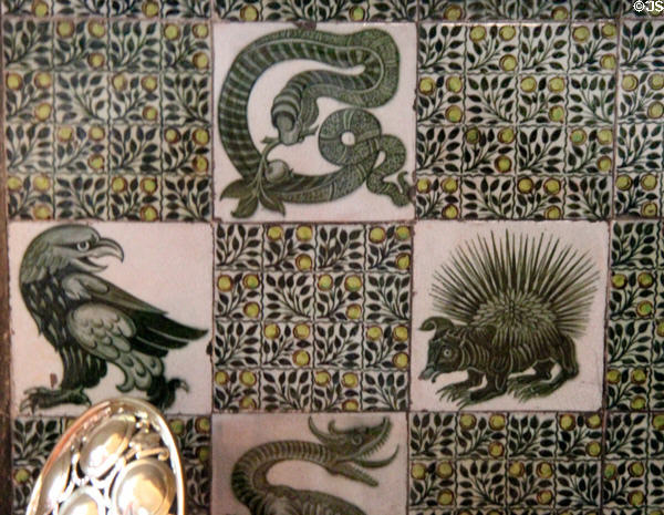 Bird & mystical animal fireplace tiles (c1888) by William De Morgan in drawing room at Wightwick Manor. Wolverhampton, England.