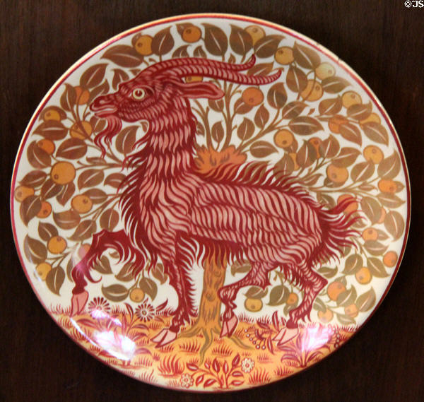 Ruby lustre plate with goat (c1900) by Charles Passenger for William De Morgan at Wightwick Manor. Wolverhampton, England.