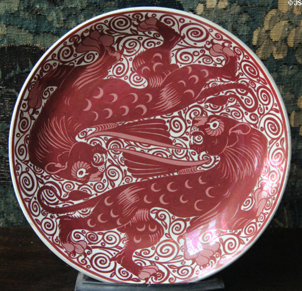 Red lustre plate with lions (c1898-1911) by Charles Passenger for William De Morgan at Wightwick Manor. Wolverhampton, England.