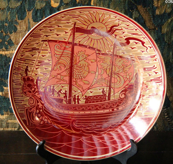 Ruby lustre plate with galleon in full sail (late 19th-early 20thC) by William De Morgan at Wightwick Manor. Wolverhampton, England.