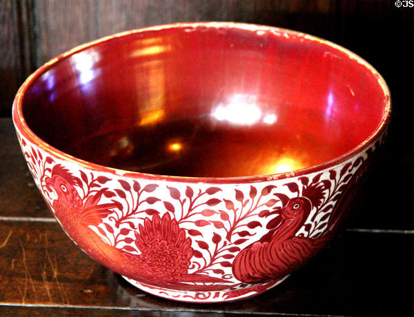 Red lustre bowl with comical birds (c1890) by William De Morgan at Wightwick Manor. Wolverhampton, England.