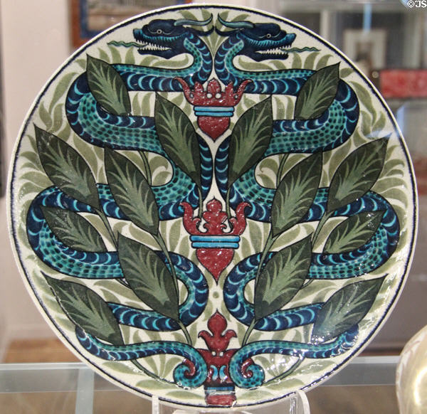 Snake & Shield tin-glazed earthenware dish (1872-1907) by William De Morgan in private collection. England.