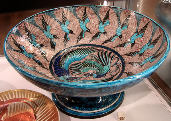 Swallow & Eagle tin-glazed earthenware punch bowl (1888-1907) by William De Morgan in private collection. England.