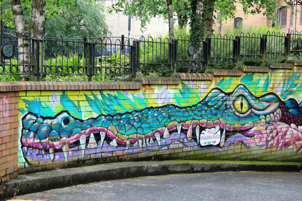 Mural of crocodile enforcing no parking sign. Belfast, Northern Ireland.