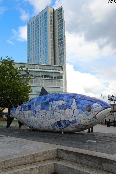 The Big Fish sculpture & Obel Tower at Donegall Quay. Belfast, Northern Ireland.