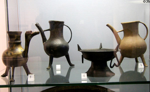 Irish bronze tripod ewers (14thC) & heating dish (16thC) at Ulster Museum. Belfast, Northern Ireland.
