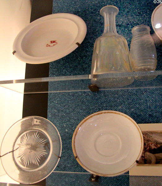 Glassware & plates salvaged from wreck of Titanic at Ulster Transport Museum. Belfast, Northern Ireland.
