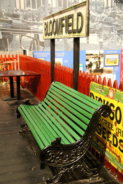 Rail station bench & platform sign for Bloomfield at Ulster Transport Museum. Belfast, Northern Ireland.