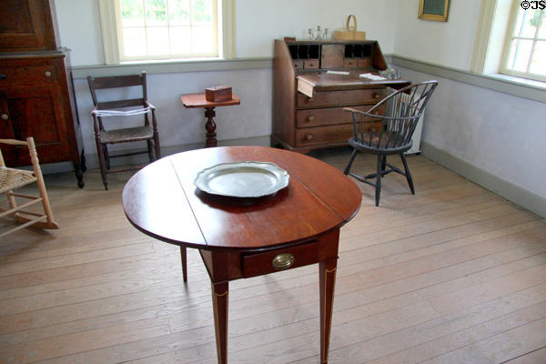 Drop-leaf table & federal era furniture in brick house at Ulster American Folk Park. Omagh, Northern Ireland.