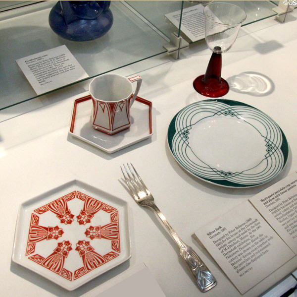 Collection of tableware (c1901) designed by Peter Behrens including red wine glass & fork at British Museum. London, United Kingdom.