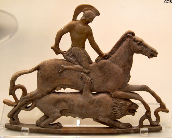 Terracotta plaque shows Bellerophon riding Pegasus raising sword against Chimera lion with goat emerging from back (450 BCE) made on Melos at British Museum. London, United Kingdom.