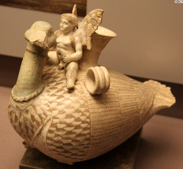 Faience vase in form of Eros riding a goose (300-250 BCE) from tomb in Tanagara, Boeotia perhaps made in Egypt at British Museum. London, United Kingdom.