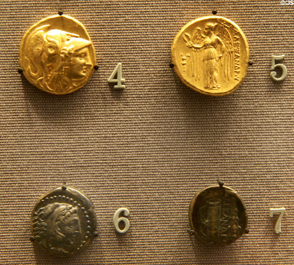Gold & bronze coins minted under Alexander III (c336-330 BCE) at British Museum. London, United Kingdom.