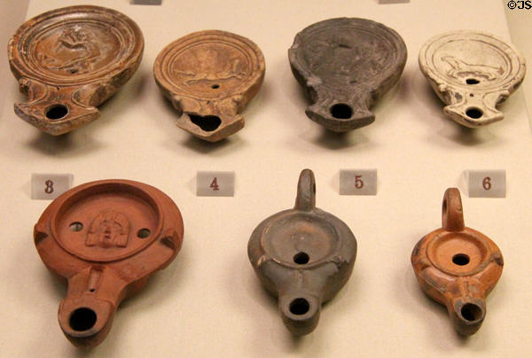 Collection of Roman oil lamps (1stC-2ndC CE) mostly made in England at British Museum. London, United Kingdom.