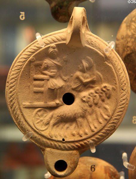 Terracotta oil lamp with Attis on a cult-car pulled by rams (c175-225 CE) made in Italy, found in Surrey? at British Museum. London, United Kingdom.