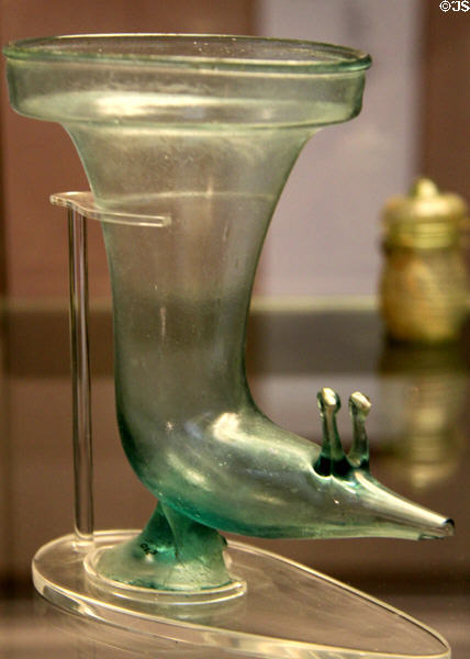 Roman blown glass drinking horn (rhyton) terminating in deer's head (50-125 CE) made in Italy at British Museum. London, United Kingdom.