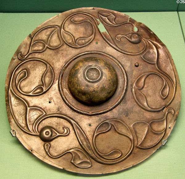Celtic culture bronze circular shield boss ornamented with repoussé stylized swirls (350-150 BCE) found in Thames near Wandsworth, London at British Museum. London, United Kingdom.