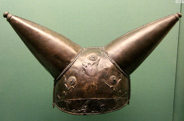 Celtic culture horned helmet of riveted sheet bronze with raised decoration (150-50 BCE) found in River Thames, London at British Museum. London, United Kingdom.