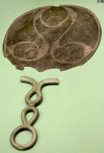 Celtic culture bronze mirror with engraved textured back (50 BCE - 50 CE) found at Aston, Hertfordshire burial at British Museum. London, United Kingdom.