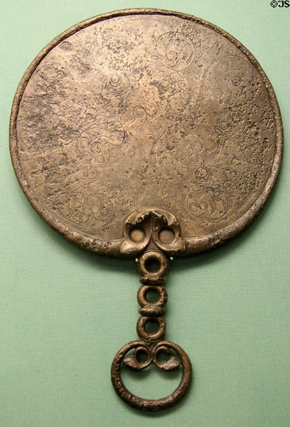 Celtic culture bronze mirror with engraved back (50 BCE - 70 CE) found at Holcombe, Devon at British Museum. London, United Kingdom.