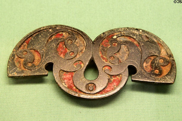 Celtic culture bronze inlaid with red glass strap union to join horse harness straps (80-125 CE) found Polden Hill in Somerset at British Museum. London, United Kingdom.