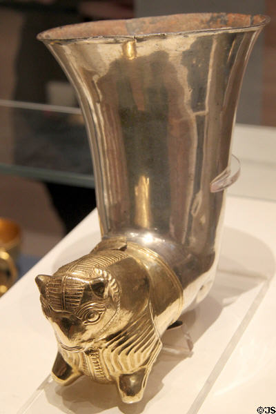 Persian or Syrian silver & gold wine drinking cup in shape of crouching bull (mid 6th-4thC BCE) at British Museum. London, United Kingdom.