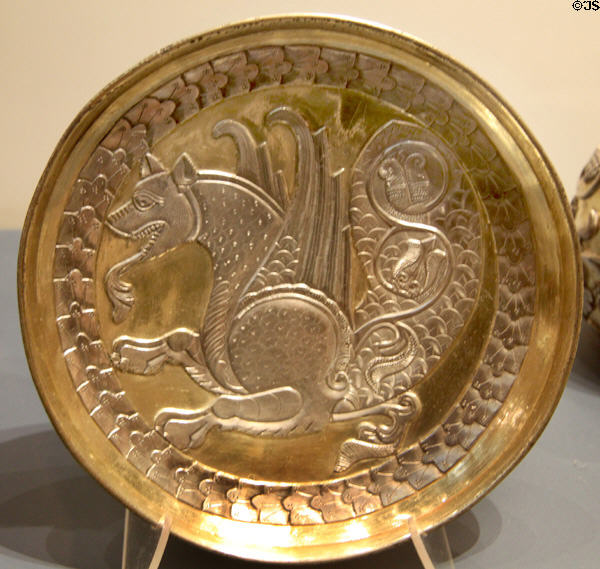 Persian silver plate with senmurw beast of Zoroastrian mythology (7thC-early 9thC CE) possibly from India at British Museum. London, United Kingdom.