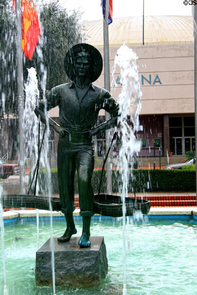 Fishmonger statue in fountain of Malaga Plaza in front of Mobile Civic Center Arena. Mobile, AL.