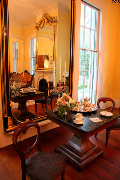 Parlor with table & mirror at Bragg-Mitchell Mansion. Mobile, AL.