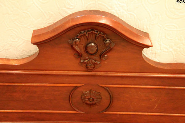 Carving details at foot of half canopy bed at Bragg-Mitchell Mansion. Mobile, AL.