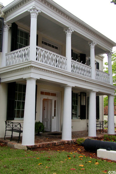Porches with criss-cross banister & portico of Conde-Charlotte House Museum. Mobile, AL.