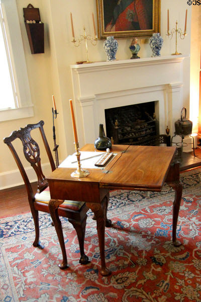 Gateleg table used as desk before library fireplace at Conde-Charlotte Museum. Mobile, AL.