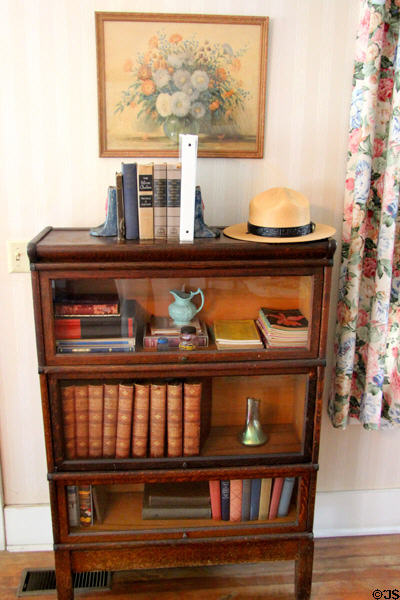 Glass-fronted bookshelf at Clinton Birthplace Home. Hope, AR.